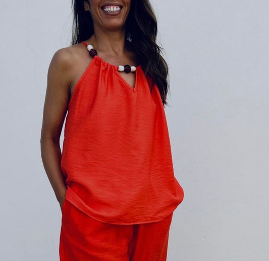 Top débardeur couleur corail avec perles