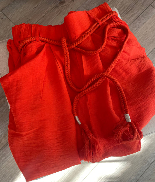 Pantalon fluide avec poches et ceinture pompons