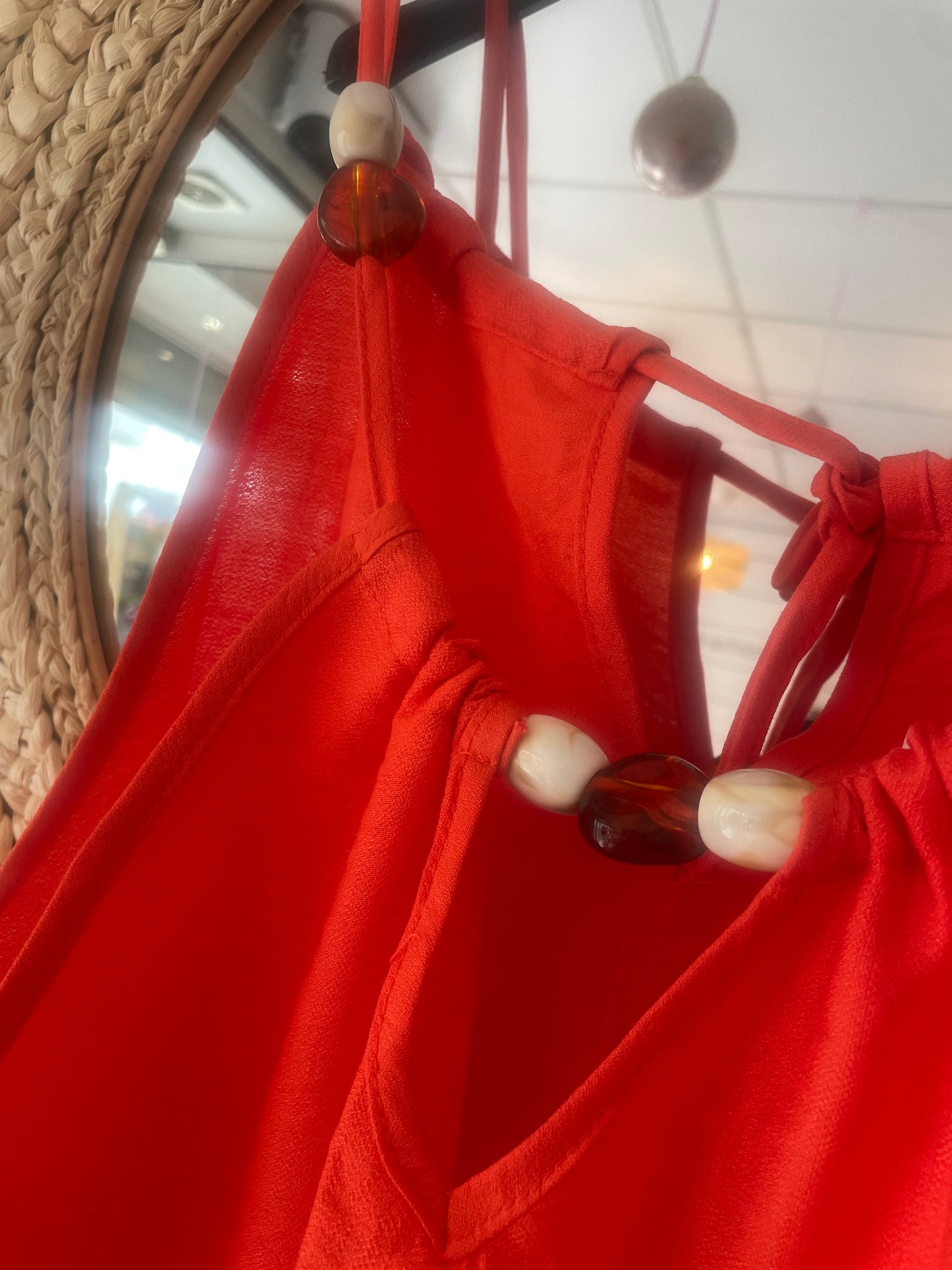 Top débardeur couleur corail avec perles