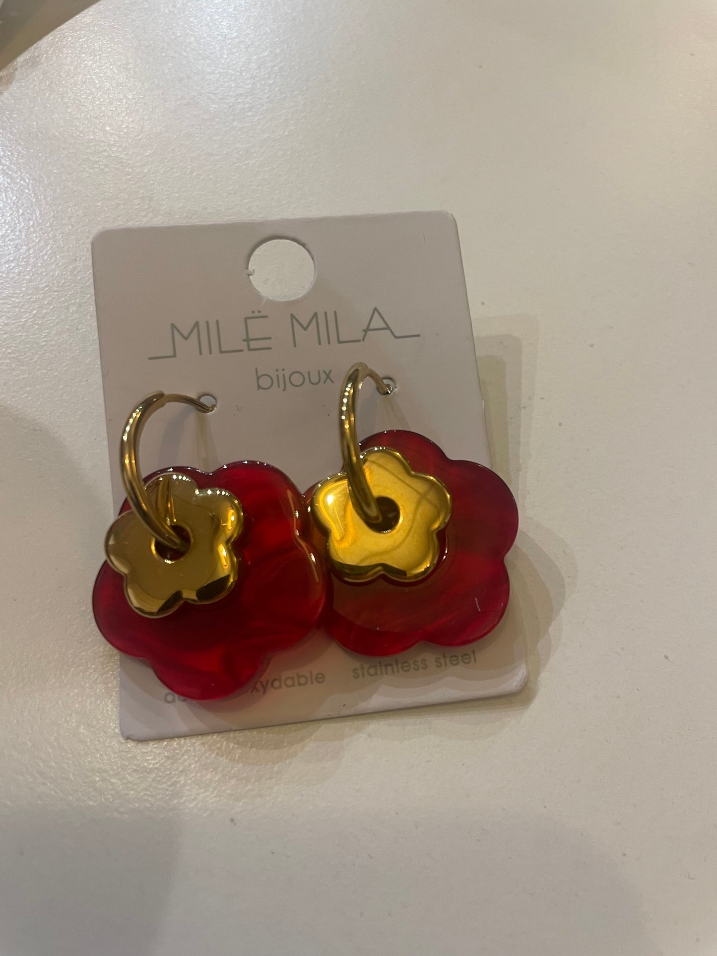 Boucle d’oreille fleur en résine