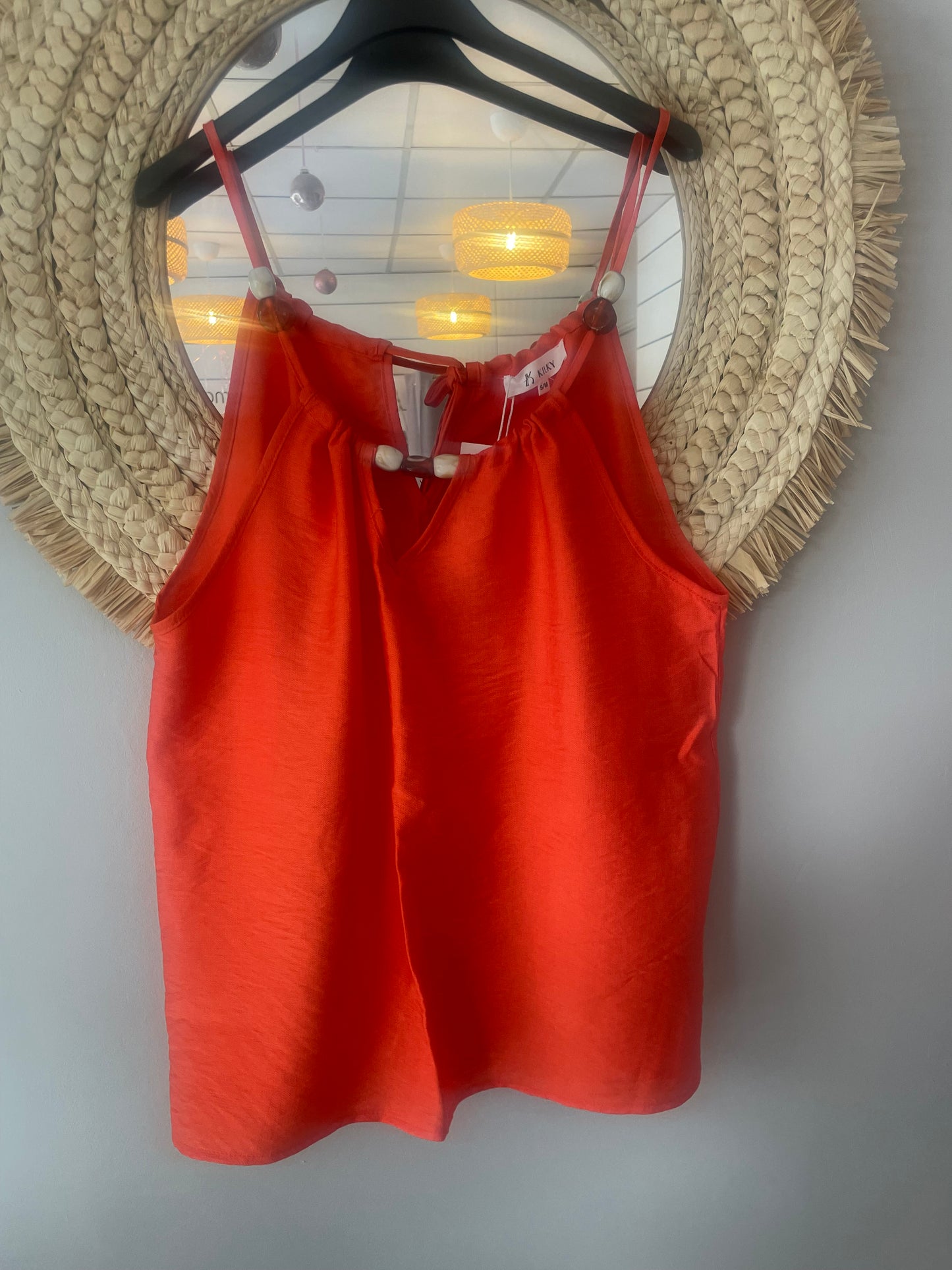 Top débardeur couleur corail avec perles