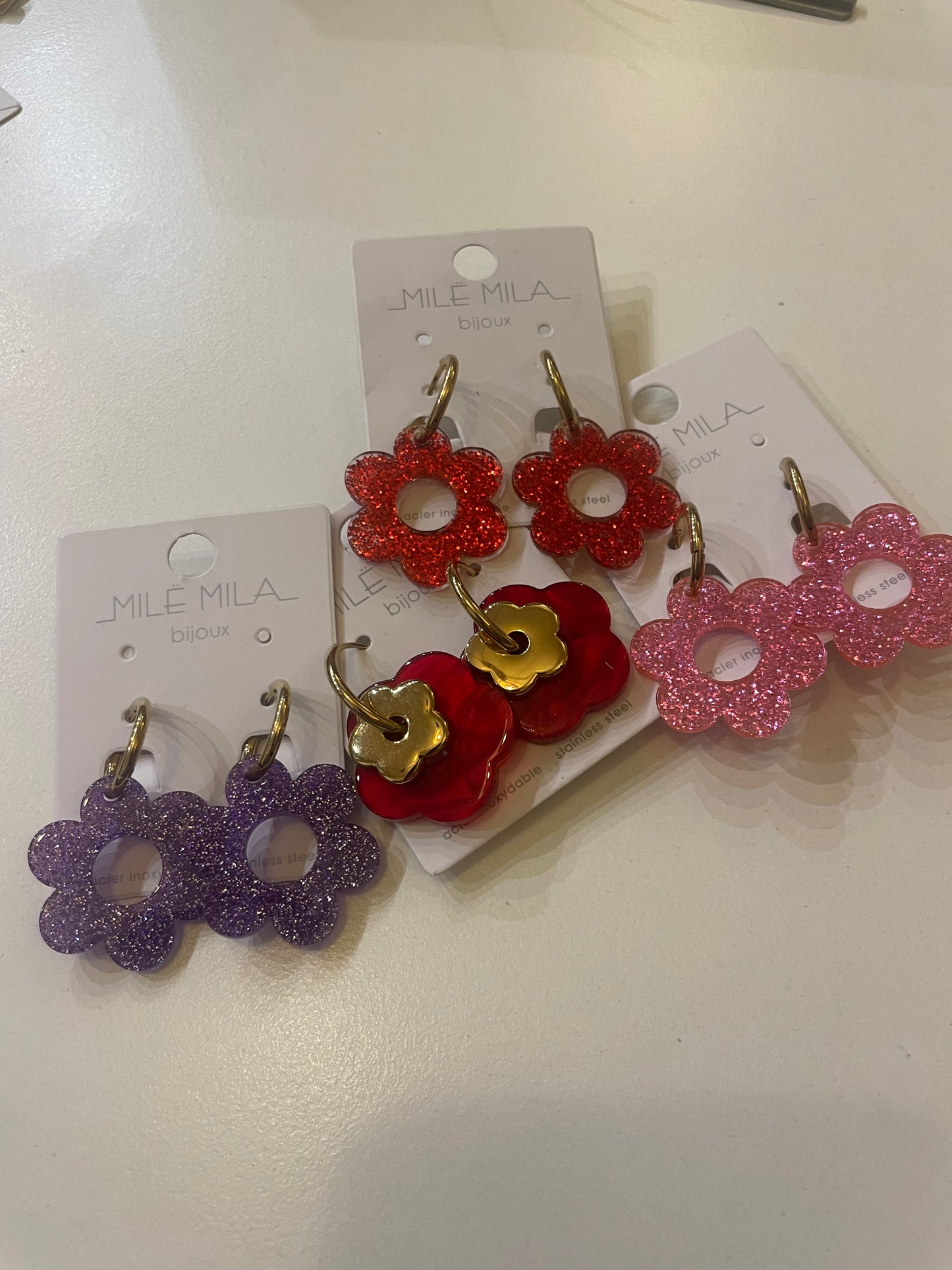 Boucle d’oreille fleur en résine