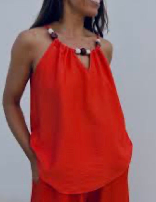 Top débardeur couleur corail avec perles