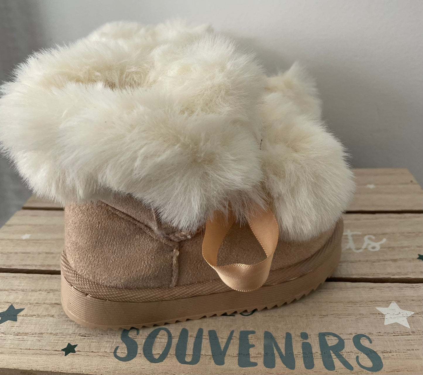 Bottines pompons beige