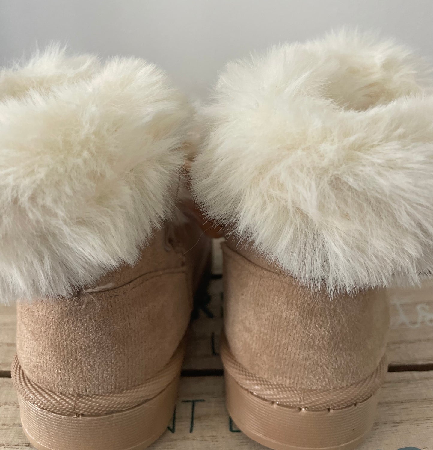 Bottines pompons beige