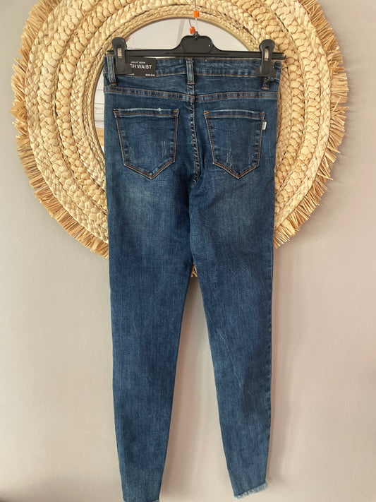Jeans slim taille haute élasthanne bas effiloché
