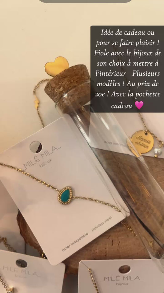 Fiole avec son bracelet à l’intérieur